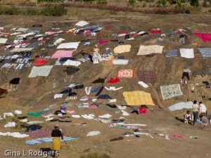 Drying clothes near the river. 